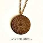 Engraved wedding pendant with personalized song lyrics